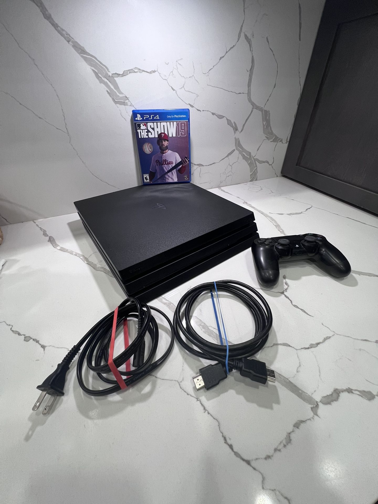 PS4 in Mint Condition + Controller Cables & Game – Ready to Play!