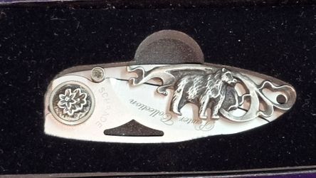 Vintage Collectible Schrade Pewter Collection Bear (SCWSB) folding pocket knife from the Wildlife Series, presented in its original display box.