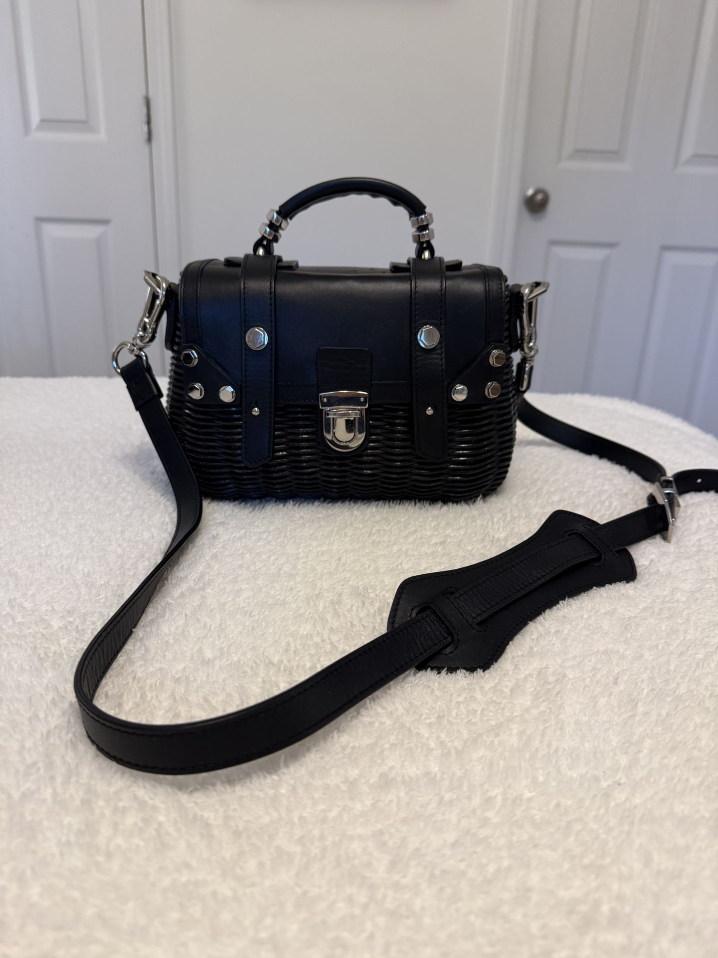Black leather rattan purse