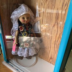 Doll In Wooden Box 