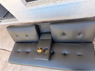 Black leather sofa couches with cup holder!