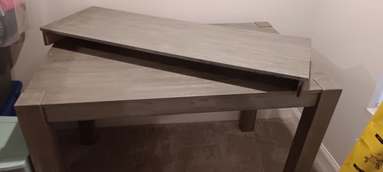 36 inch High Wooden Dining Table and 18-inch leaf extension.