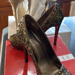 Two Pairs Of High Heels $15. Each Pair Sizes 5 & 8