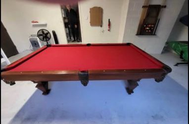Pool table w red felt  + cues,balls,&wall rack