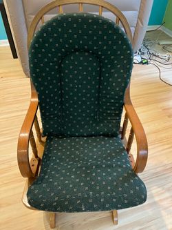 Dark green glider chair