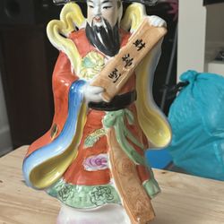 Porcelain figurine of Caishen The Chinese God of Wealth Scroll Reads “God of Wealth arrives”