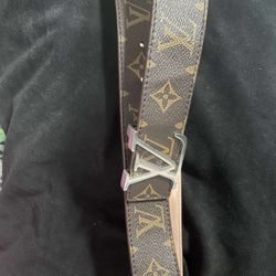 Brown and tan Louis Vuitton belt precio negociable