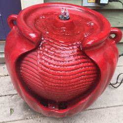Red glazed pot fountain