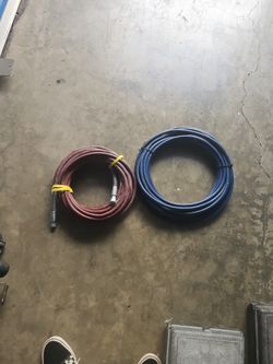 Spray Paint Hose Red New And Blue Used