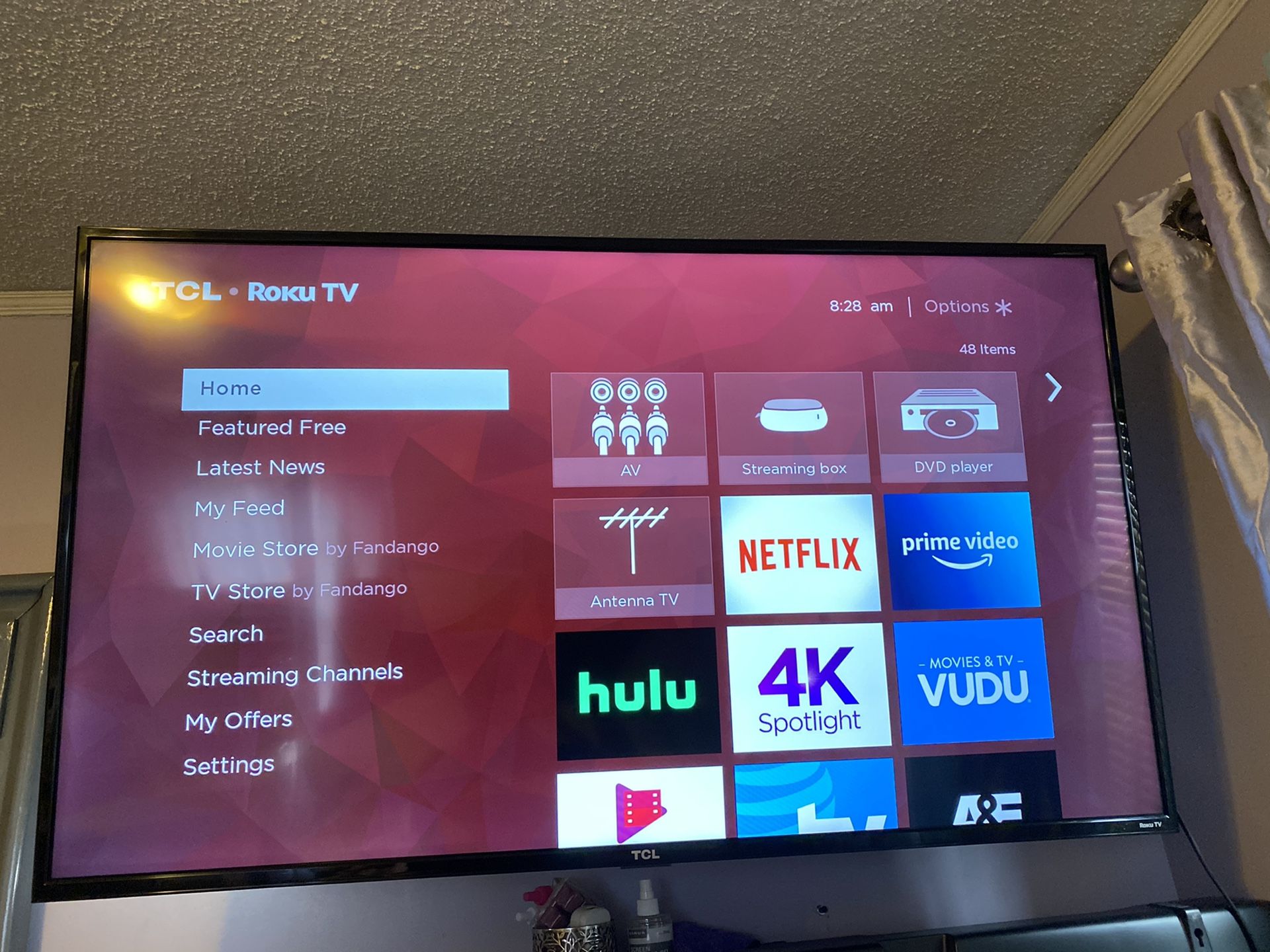 65 inch tcl flat screen smart tv roku