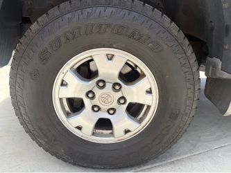 Tacoma wheels and nearly new Sumitomo AT 265/75 R16 tires