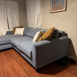 Living Spaces Light Blue Sectional Couch