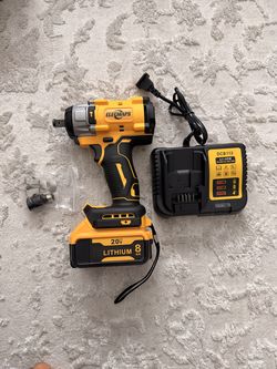 Impact wrench with battery and charger