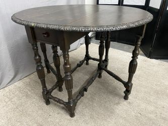 Antique Ornately Carved Drop Leaf Wooden Dining Table