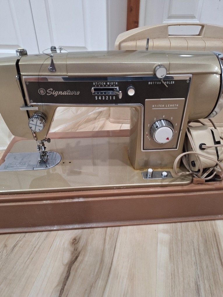 Signature Sewing Machine