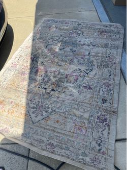 Two FREE RUGS Needs a wash