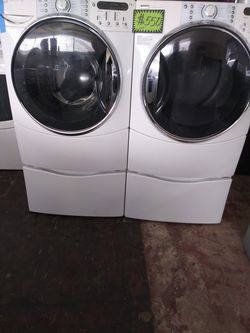 Kenmore front load washer and dryer set with pedestals in excellent conditions