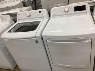 LG 4.3 cu.ft. Top Load Washer and 7.3 cu.ft. Electric Dryer Set with NeveRust Drum