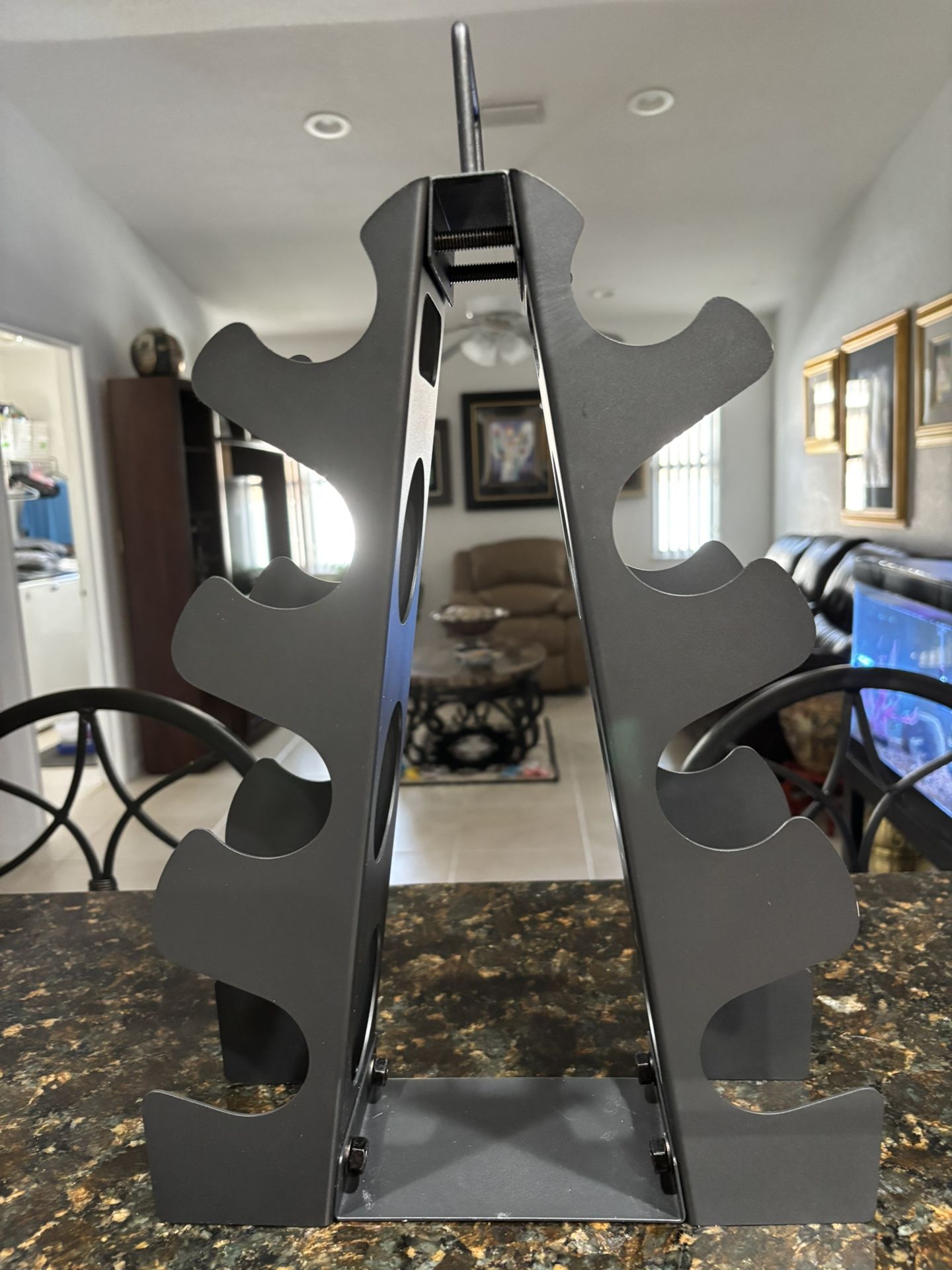 New dumbbell rack stand. black metal. 12”W x 16”H. holds 5-15 pound weights