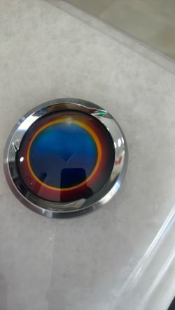 Karma Revero emblems with designer's signature