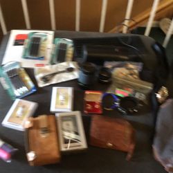 A Few Old Fashioned , Vintage Items  Like A Nice Pair Of Pins For Men Shirts , A Leather  Wallet , Two Light Swishers And More