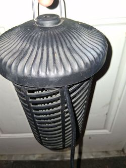 Black hanging outdoor bug zapper
