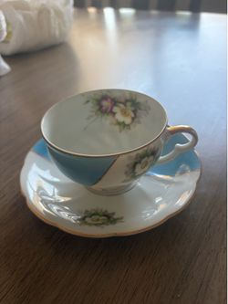 Antique tea cup and plate set