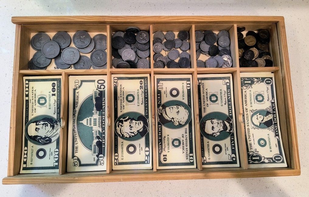 Melissa and Doug play money in a wooden money box. Good condition