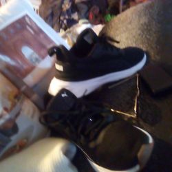 Puma's  9 1/2 Black And White 