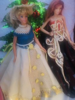 Two vintage beautifully dressed Barbie’s like New condition 11 inches tall