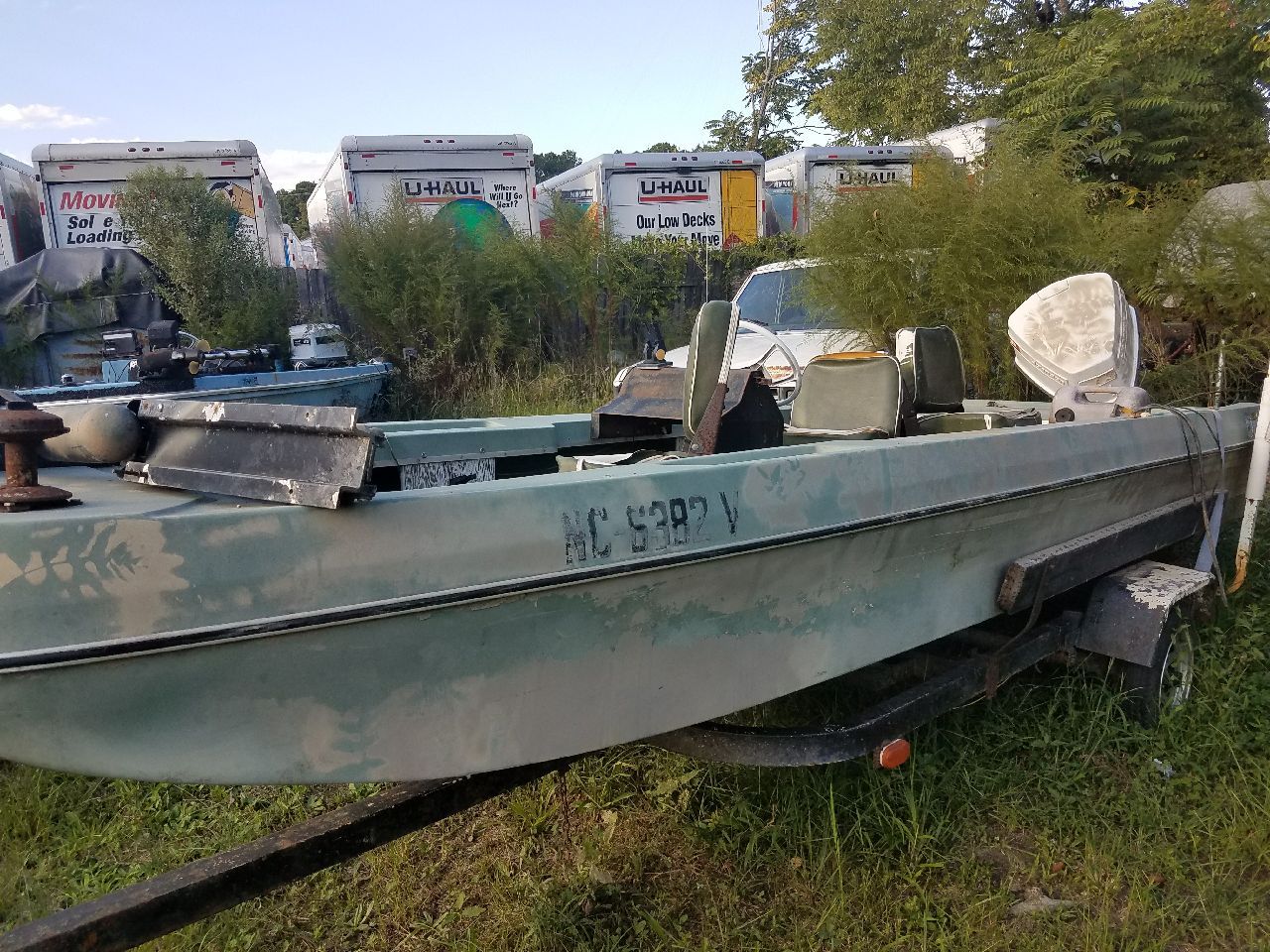 16 ft fiberglass bass boat. NEEDS WORK. Tailer needs tires. Need gone