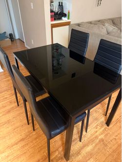 Dinner table with chairs