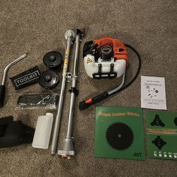 Brand new heavy duty brush cutter - only issue is part of the orange plastic covering is missing