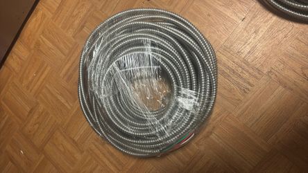 100 ft MC Cable 12/3 with Ground. New/Unused.