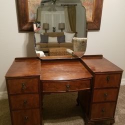 Antique vanity with large beveled mirror