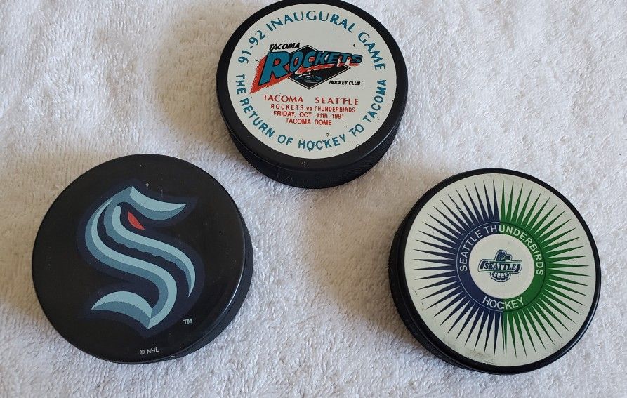 3 seattle team hockey pucks krackens, rockets and thunderbirds inaugural all for price