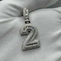 A Moissanite Number charm in Silver CZ with a CTW of 2.20