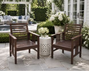 Two brown wooden patio chairs