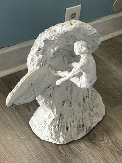 Beach surfer sculpture