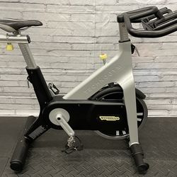 TechnoGym Indoor Group Cycling Commercial-Grade Spin Bike Trainer Exercise Bicycle Workout Gym
