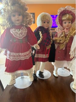 Porcelain dolls on stands