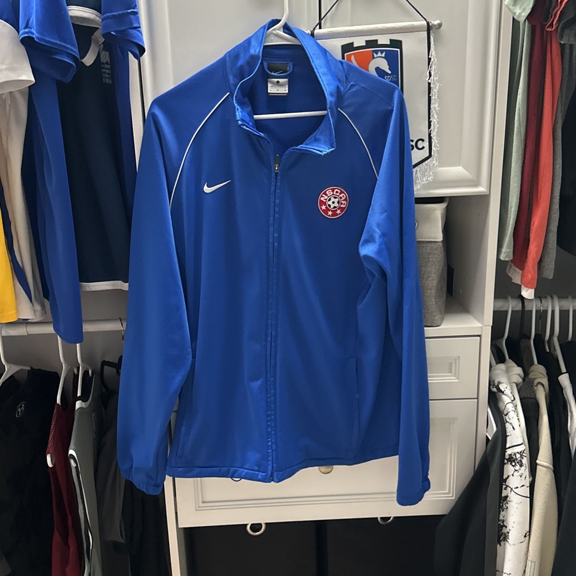 Nike tracksuit top and with nscaa soccer badge