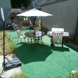 Barbecue Pit Table Umbrella And Four Chairs