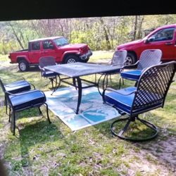 Good Condition 7 Piece Outdoor Wrought Iron Table Set With New Cushions Included 