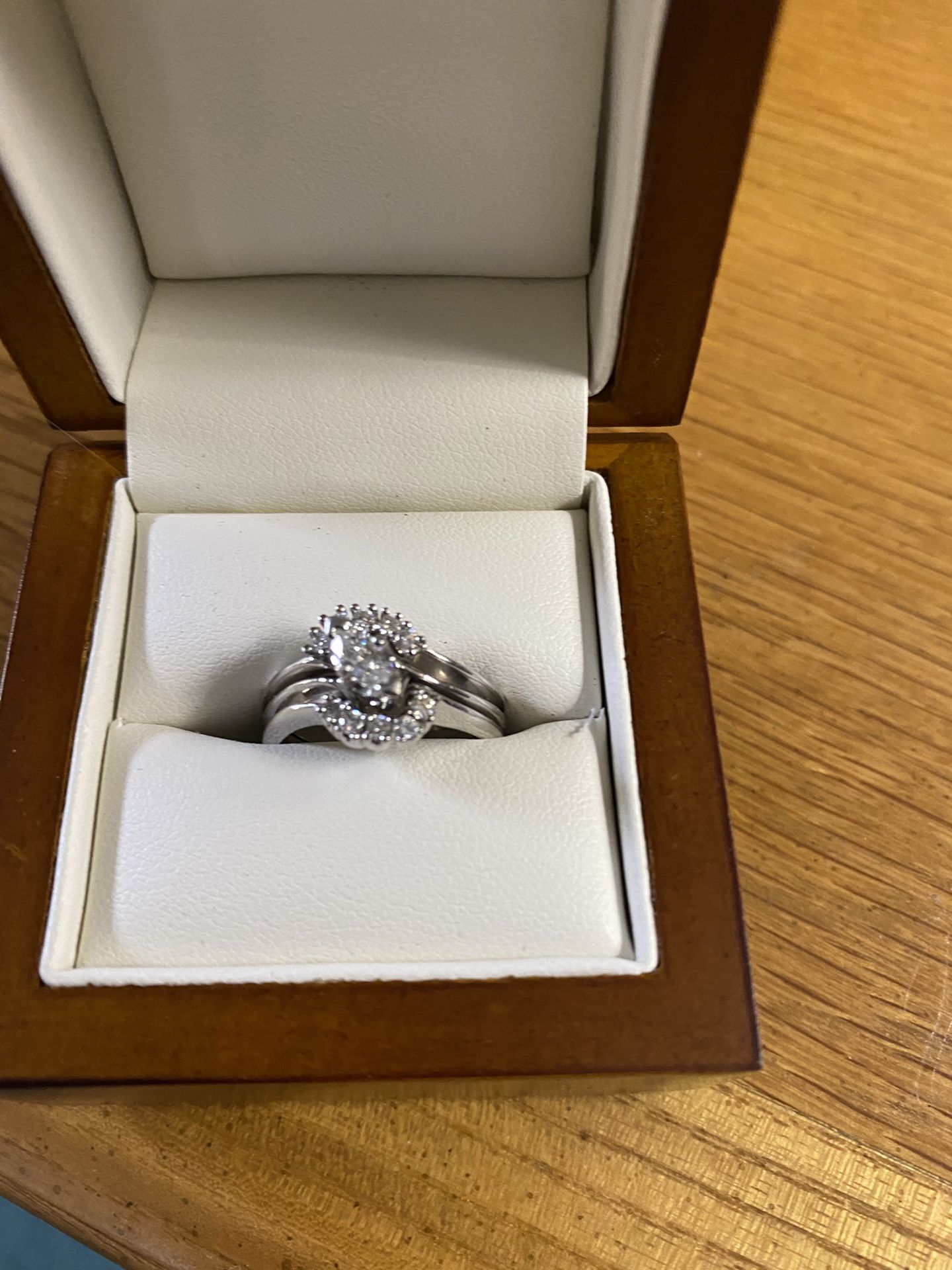 14 K white gold diamond marquises wedding ring with 10 smaller diamonds size 7. Appraised in 2018 for $2225.00. Will supply appraisal paperwork.