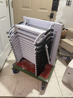 Carbon Steel, 14-step, 880lbs capacity wall-mounted ladder.