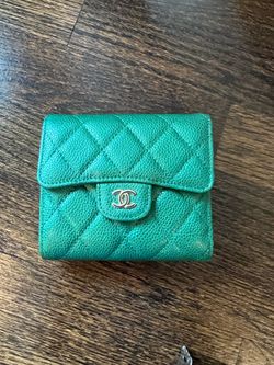 Green leather trifold wallet