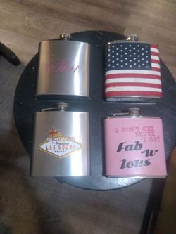4 Different Drinking Flask 6oz. 20 dollars or 5 dollars each.