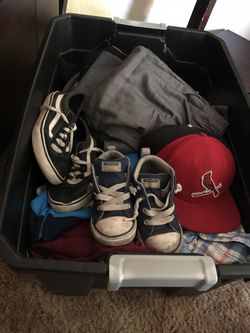 Box full of kids clothes