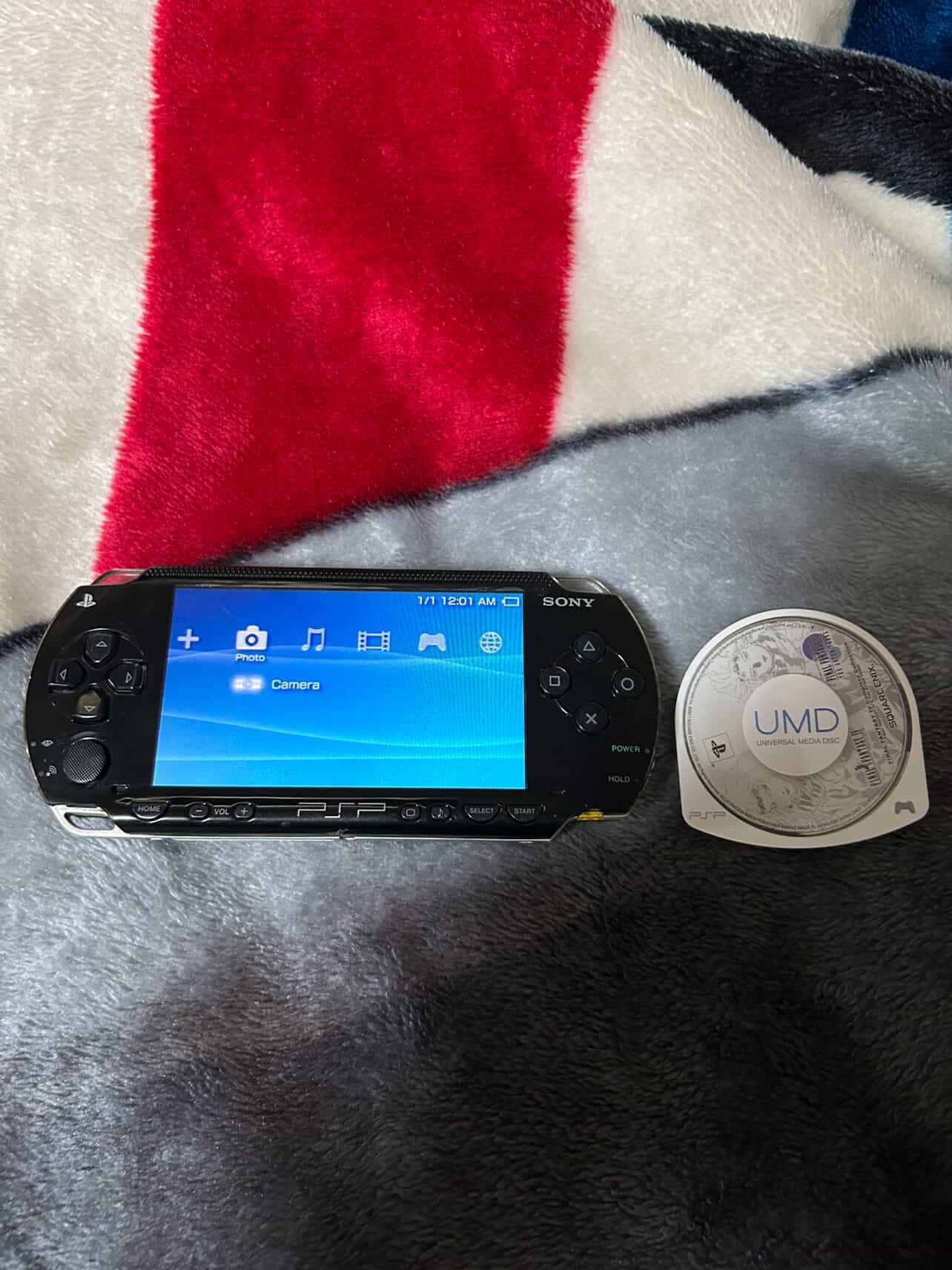 Black Sony PSP w/ Charger & 1 Game